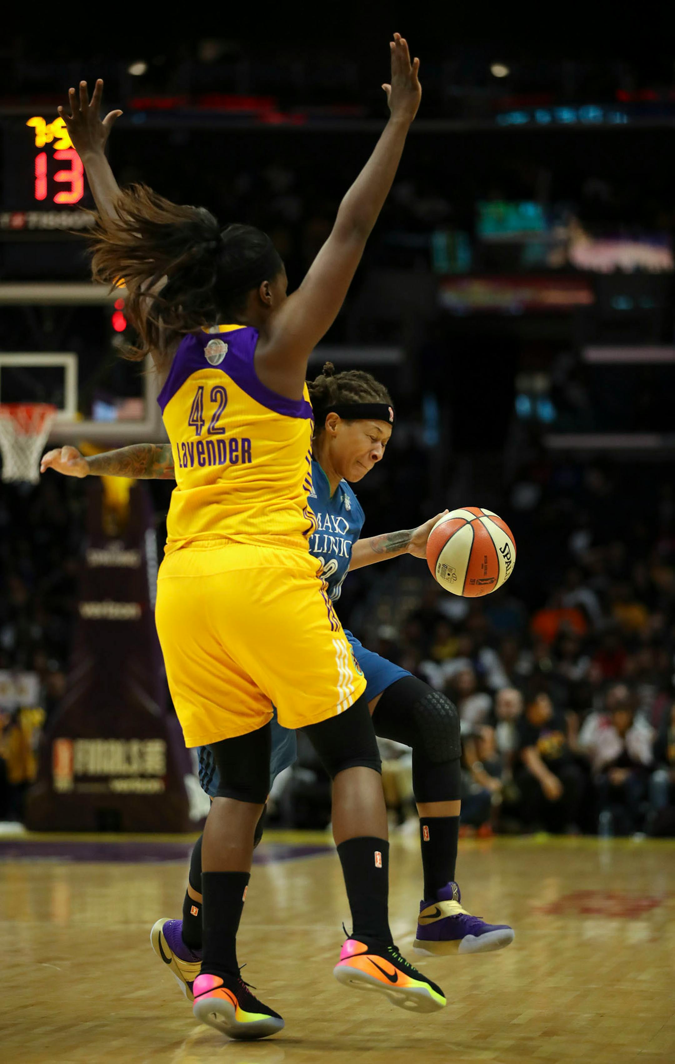 Minnesota Lynx guard Seimone Augustus (33) was fouled in the second quarter by Los Angeles Sparks center Jantel Lavender (42).