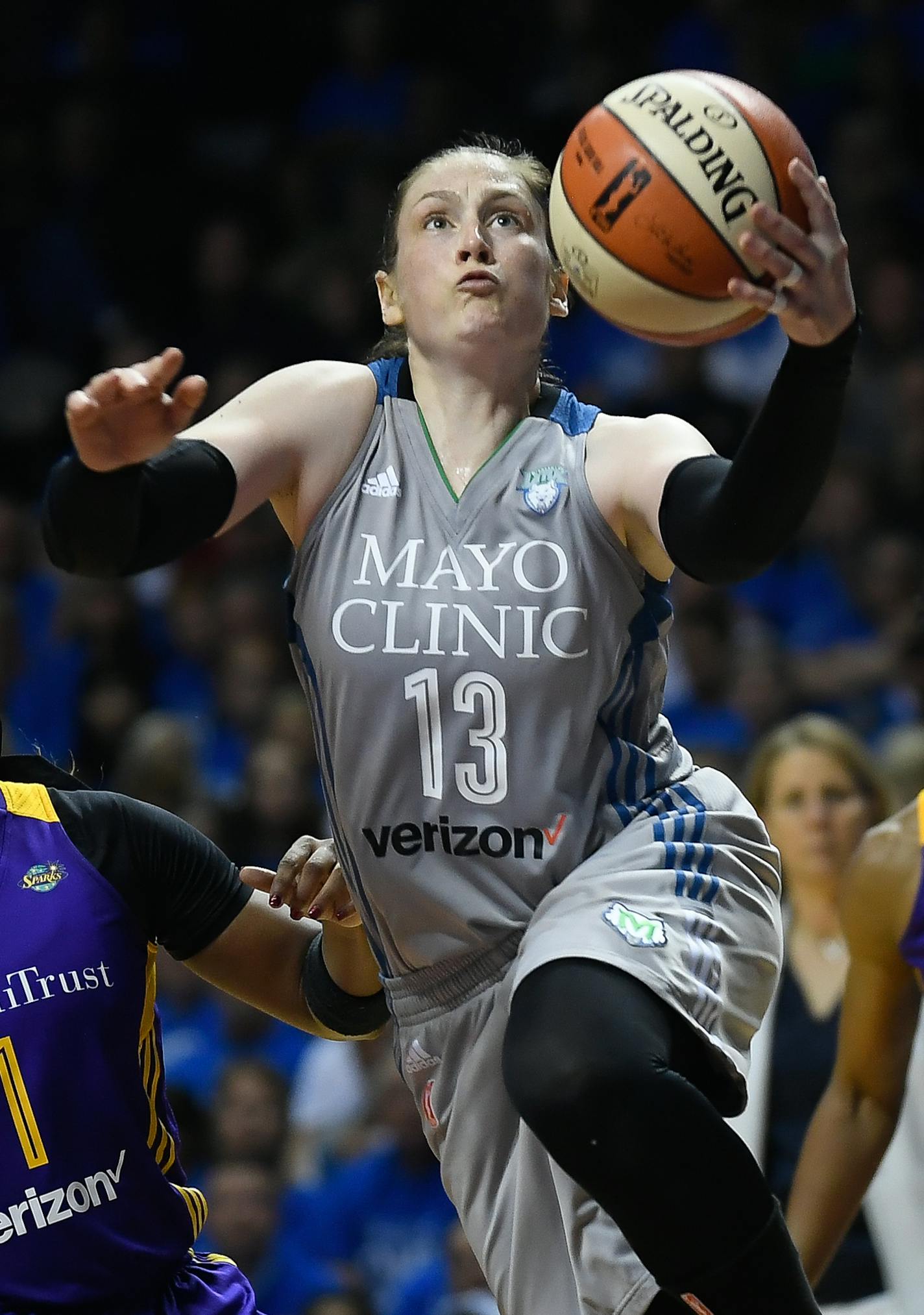 Minnesota Lynx guard Lindsay Whalen (13) scores a layup and is fouled by Los Angeles Sparks forward Candace Parker (3) for an and-one opportunity in the second half during Game 2 of the WNBA Finals on Tuesday, Sept. 26, 2017, at Williams Arena in Minneapolis. The Lynx leveled the series, 70-68. (Aaron Lavinsky/Minneapolis Star Tribune/TNS) ORG XMIT: 1212013