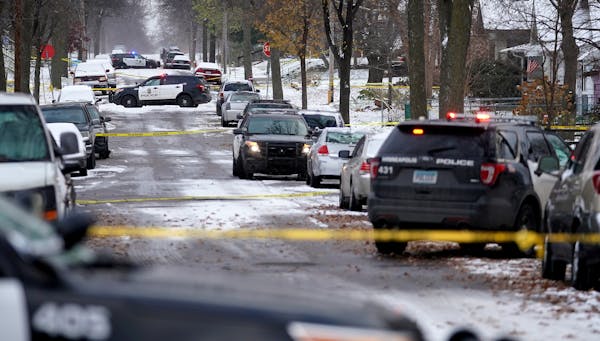 Police taped off the street at the scene of an officer involved shooting Friday in the 3700 block of Morgan Avenue North in north Minneapolis. ] ANTHO
