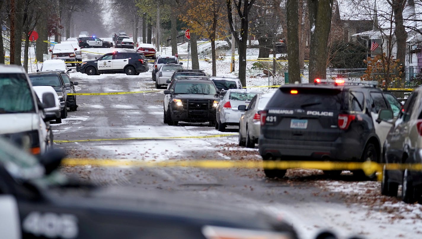 Police taped off the street at the scene of an officer involved shooting Friday in the 3700 block of Morgan Avenue North in north Minneapolis. ] ANTHONY SOUFFLE &#xef; anthony.souffle@startribune.com Police responded to the scene of an officer involved shooting, where a suspect allegedly armed with a knife was shot in the stomach, Friday, Nov. 9, 2018 in the 3700 block of Morgan Avenue North in north Minneapolis.