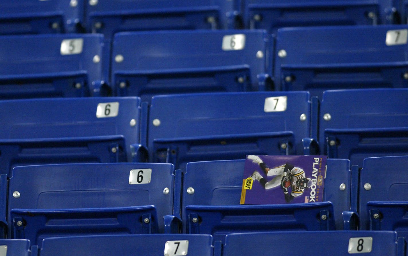 GENERAL INFORMATION: MINNEAPOLIS - 12/23/01 - The Vikings lost their final home game of the season to the Jacksonville Jaguars Sunday afternoon at the Metrodome by a score of 33 - 3. IN THIS PHOTO: A photo of Cris Carter, who may have played his final home game as a Viking, was left behind on a Metrodome seat at the end of the game. ORG XMIT: MIN2013020217220833 ORG XMIT: MIN1310071122492474