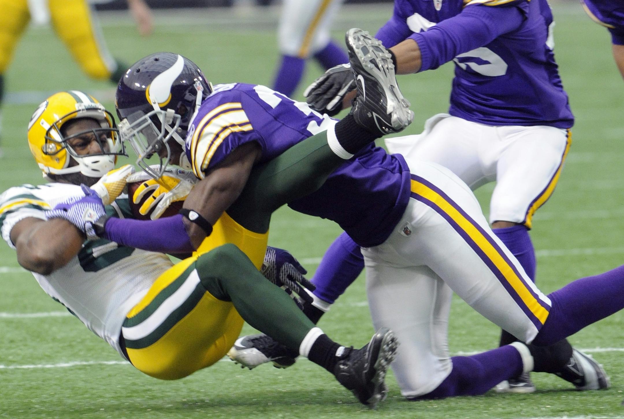 Husain Abdullah (center) turned down a one-year contract offer from the Vikings this offseason in order to prepare for his Muslim pilgrimage to Mecca, Saudi Arabia.