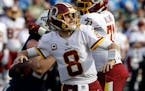 Washington Redskins quarterback Kirk Cousins passes the ball against the Los Angeles Chargers during the first half of an NFL football game Sunday, De