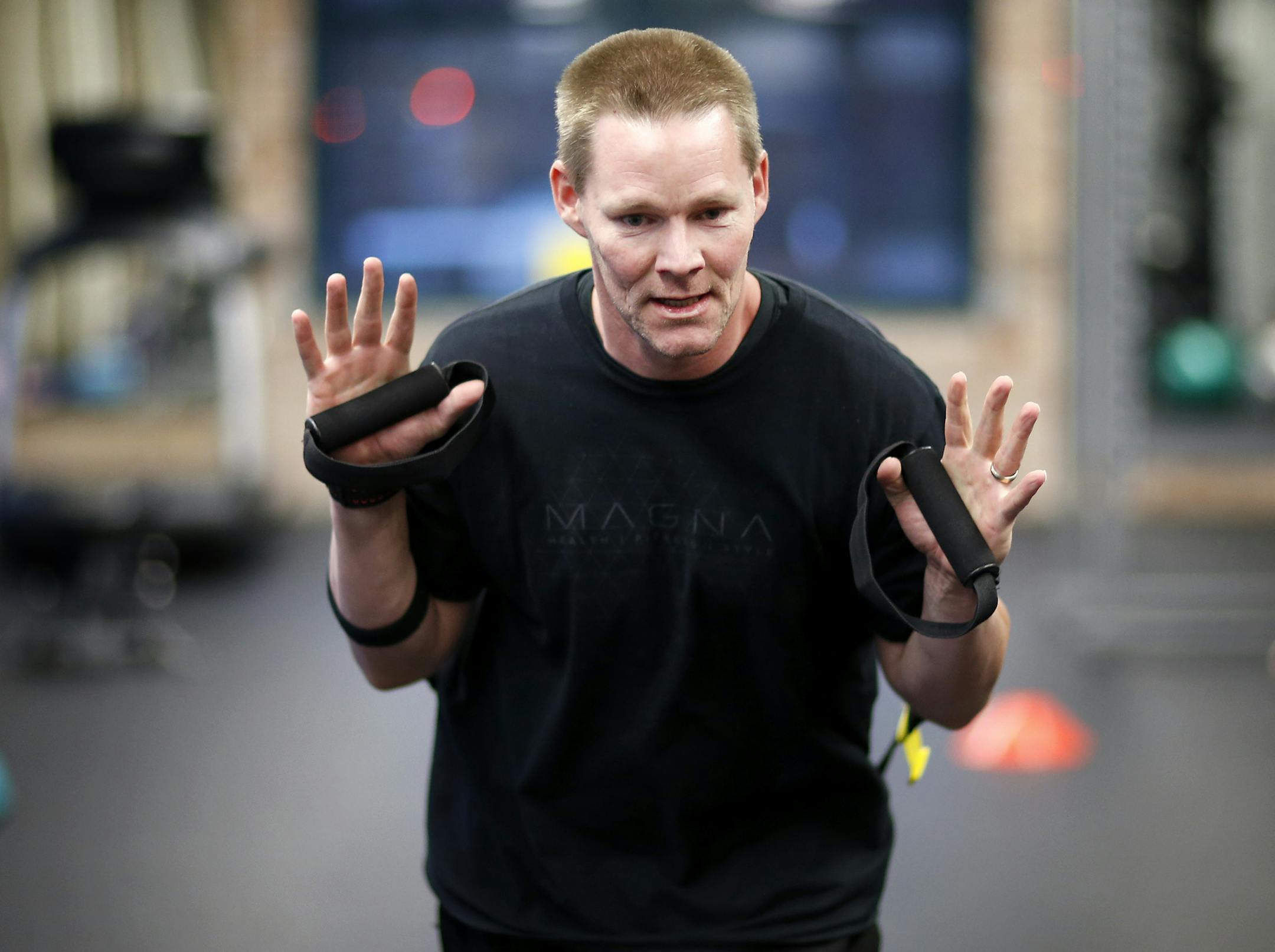 Scott Herman taught a boot camp fitness class Magna Gym in Minneapolis. ] CARLOS GONZALEZ cgonzalez@startribune.com October 29, 2013, Minneapolis, Minn., how i got this body profile about Scott Herman - a former soldier who suffered sever burns and PTSD - found a new start as a personal trainer