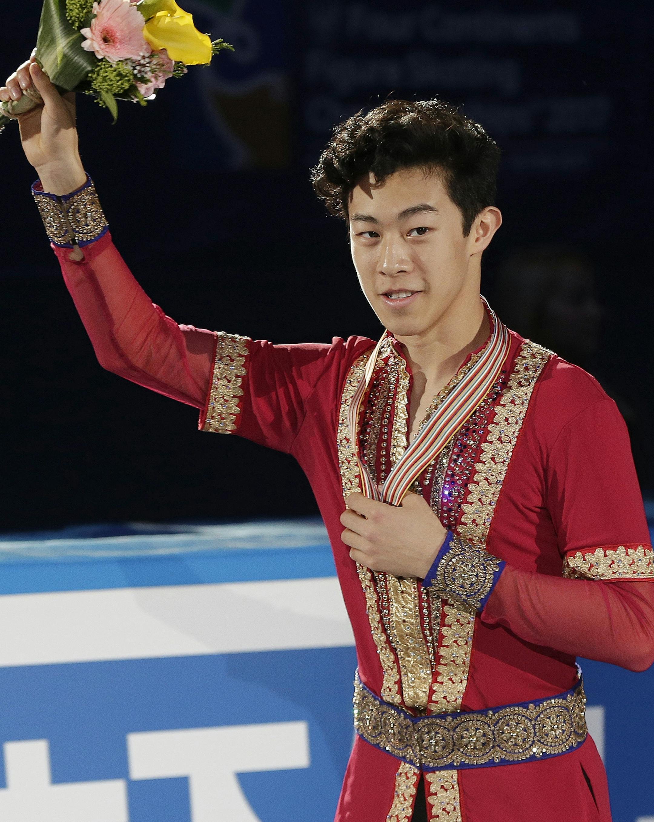 Gold medalist Nathan Chen of the United States waves during the medal award ceremony for the men's free skating at the ISU Four Continents Figure Skating Championships in Gangneung, South Korea, Sunday, Feb. 19, 2017. (AP Photo/Ahn Young-joon)