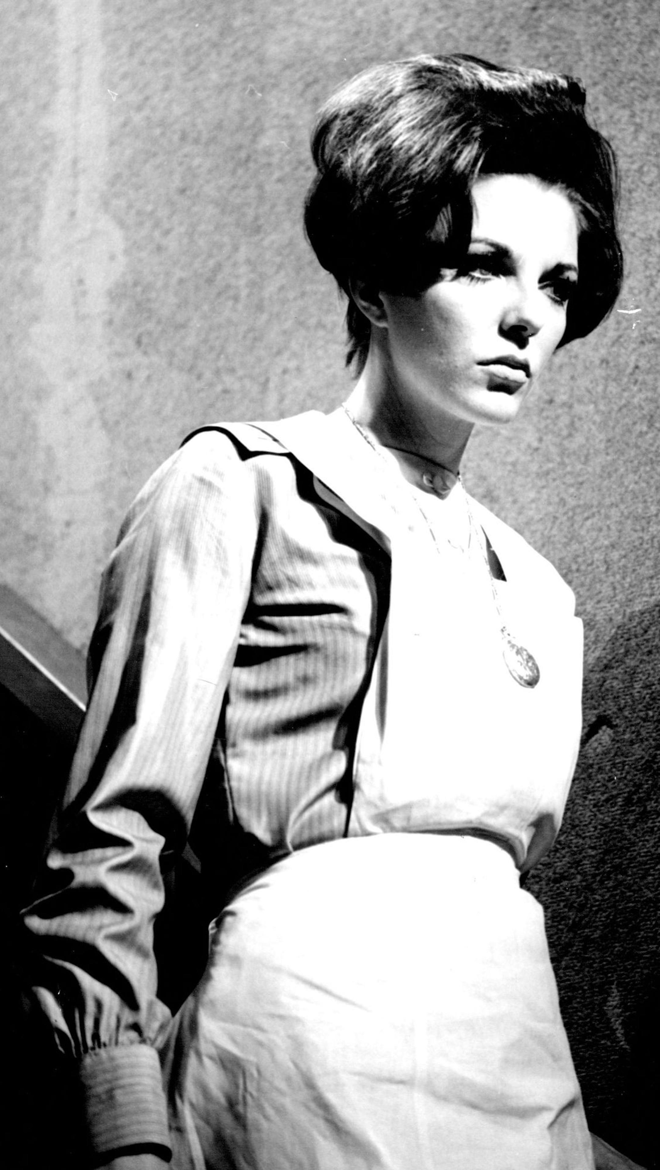 March 1, 1957 MISSION WORKER - Joan Collins stars as Sister Edith Keeler, a skid row mission worker who meets crew members of the space U. S. S. Enterprise when they return in time 200 years to the tragic depression days of the 1930's in "City On The Edge of Forever" on NBC-TV's colorcast of "Star Trek" Thursday, March 30 (8:30-9:30 p.m. PST & EST; 7:30-8:30 p.m. CST).