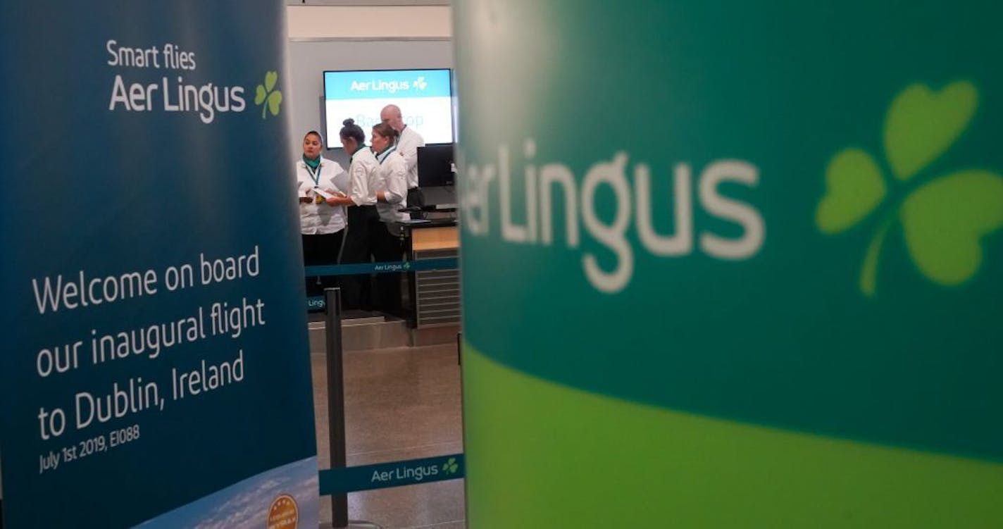 Aer Lingus crew members got a briefing at the check in counter. Today is the first direct flight from Dublin to MSP.