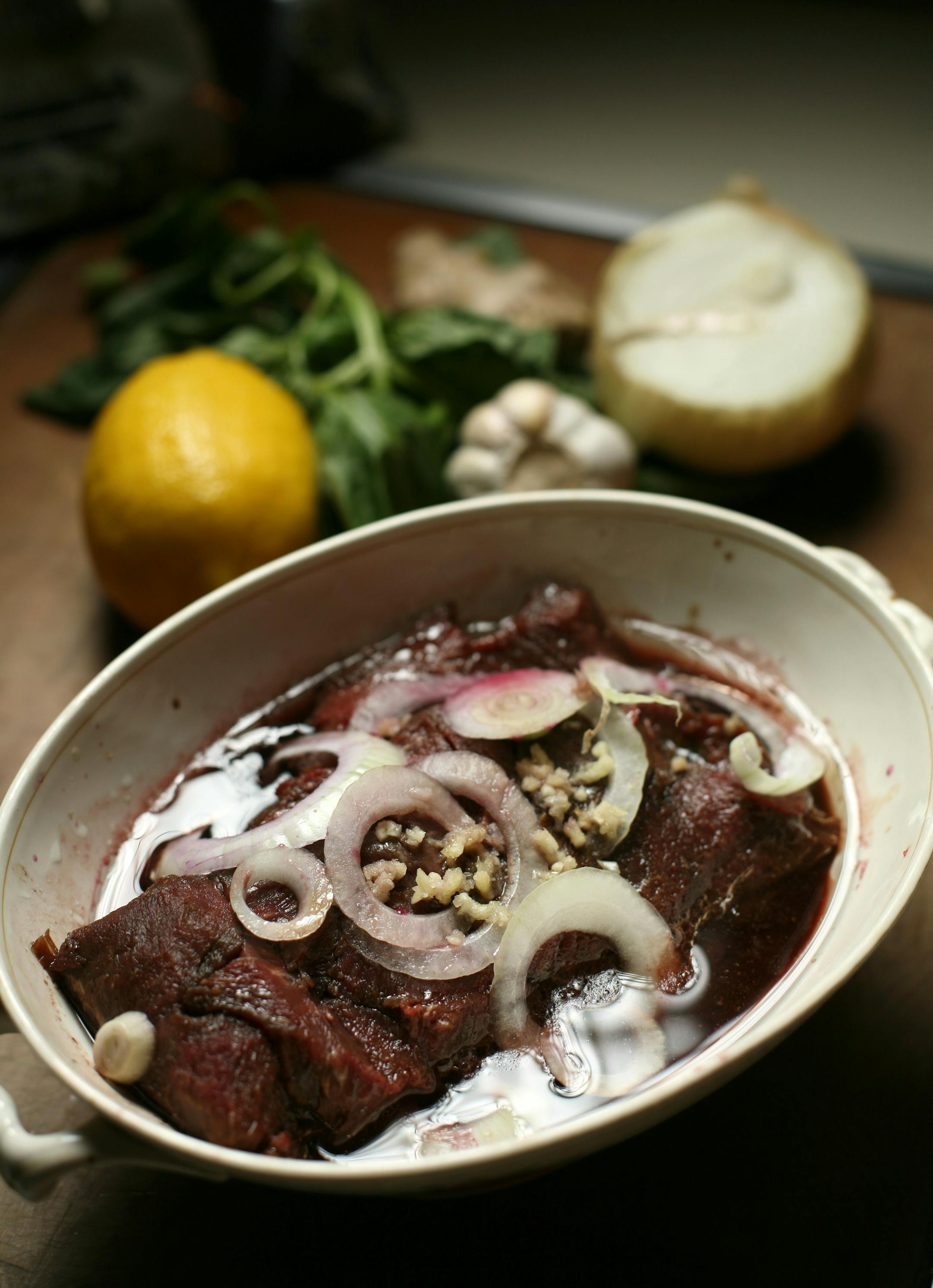 A venison loin was marinating and ready for the grill.