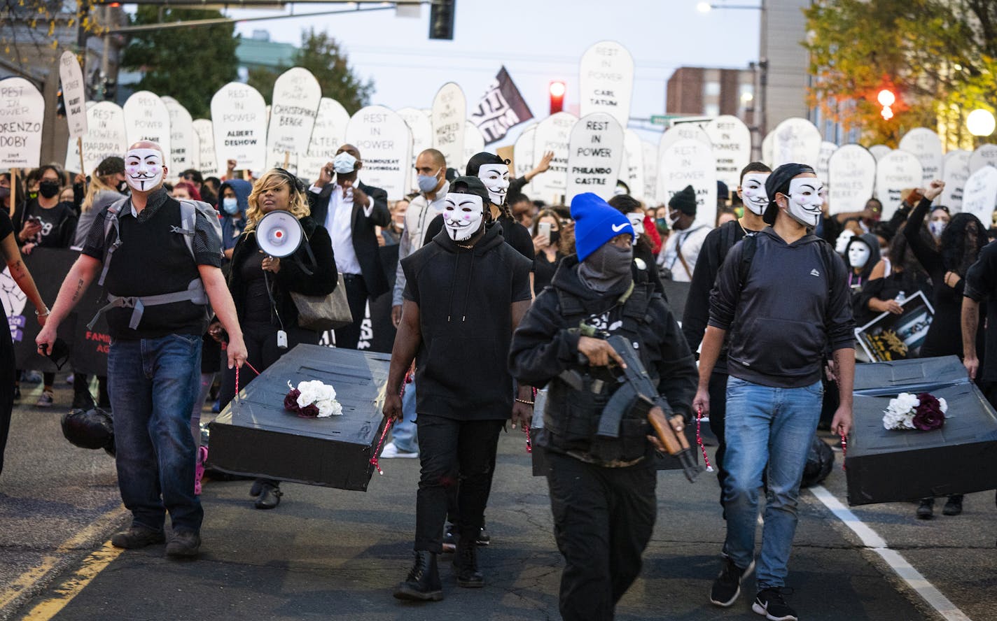 Families of those killed by police marched with hundreds of supporters Thursday in St. Paul to the Minnesota State Capitol.