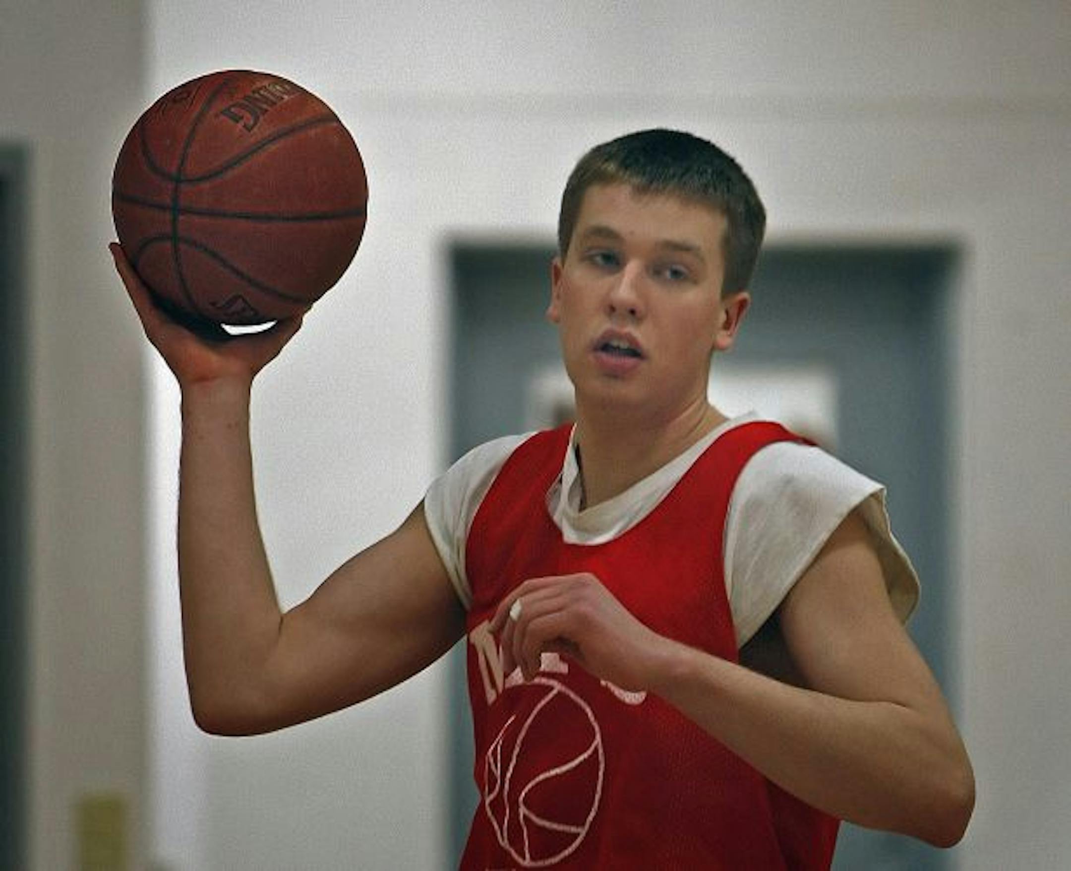 Kevin Noreen practiced with teammates on the Minnesota Transitions High School team recently. Noreen, a 6-10 senior, will likely break the state�s career scoring mark this season.