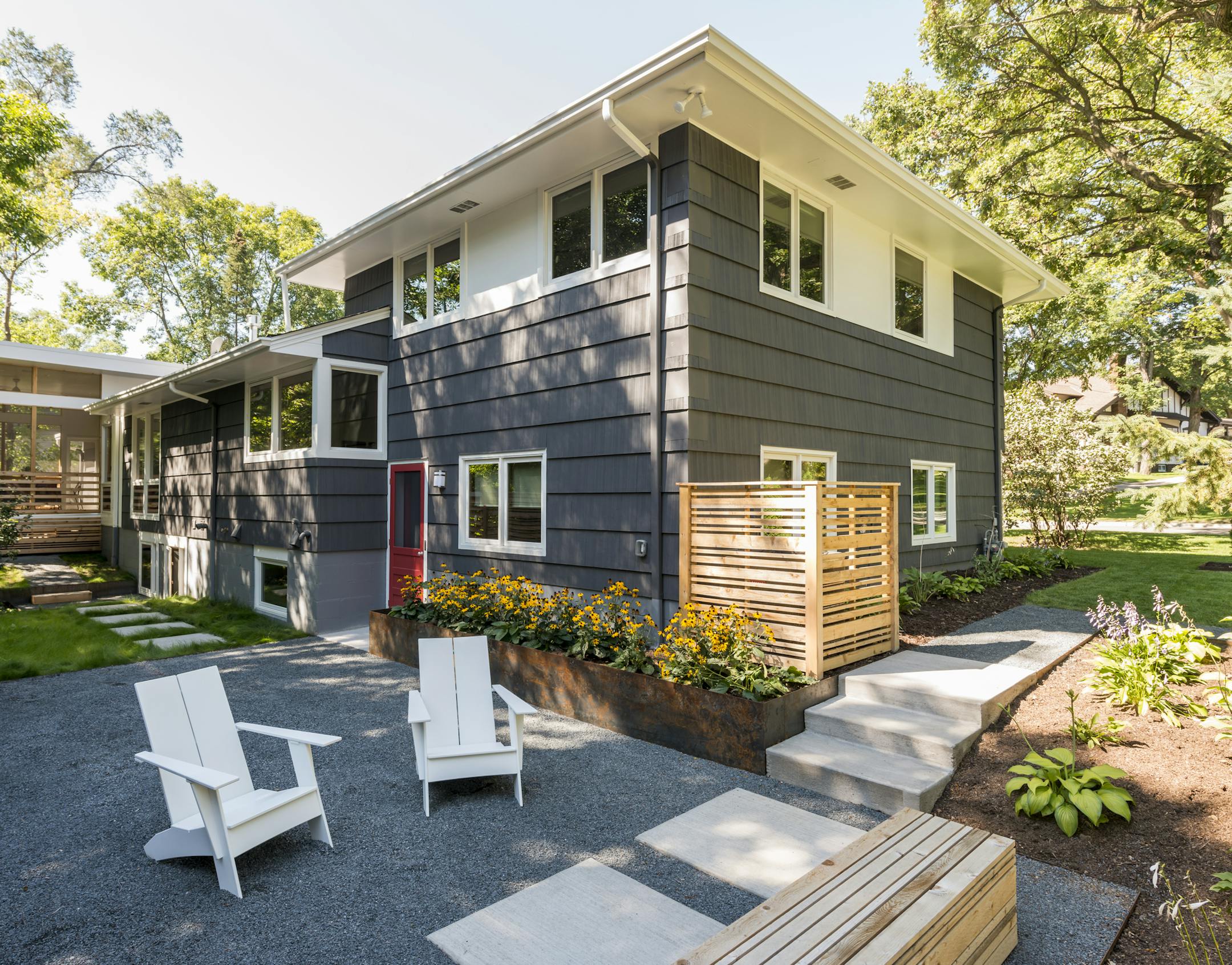 New landscaping, exterior paint and a patio area in the backyard contributed to the renovation of the 1958 Edina home.