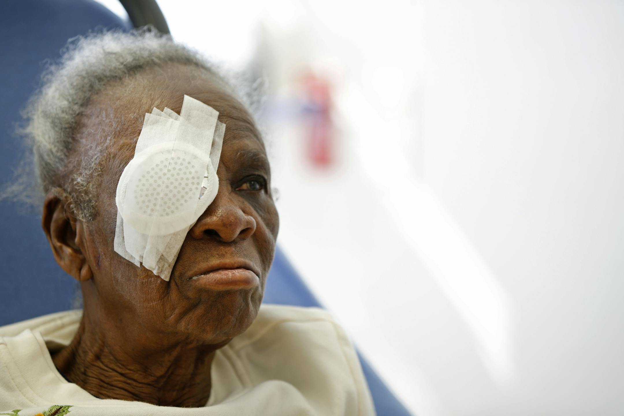 Florence Odujole listened intently while she received instructions for post-op care after her cataract surgery.