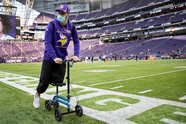 Vikings' Adam Thielen back on his feet after ankle surgery