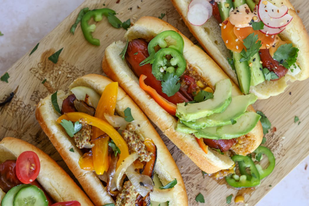 Serve a variety of toppings for a hot dog hoedown.