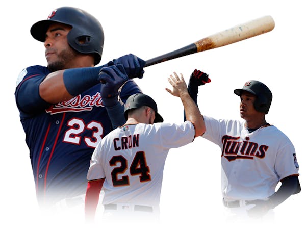 From left, Nelson Cruz, C.J. Cron and Jonathan Schoop are all Twins newcomers who can hit the ball over the fence ... and strike out ... and draw a wa