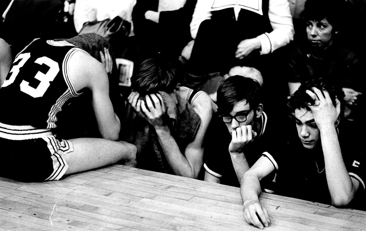 March 22, 1970 South St. Paul's basketball players showed the effects of losing Saturday night after being beaten 78-62 by Sherburn in the finals of the Minnesota high school basketball tournament at Williams Arena. Soon after this moment the Packers rose as a unit and slowly walked onto the floor to accept the second-place trophy. March 21, 1970 John Croft, R. Bertrand Heine, Minneapolis Star Tribune