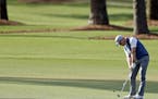 Amateur Sammy Schmitz his a shot on the third hole during the second round of the Masters golf tournament Friday, April 8, 2016, in Augusta, Ga. (AP P