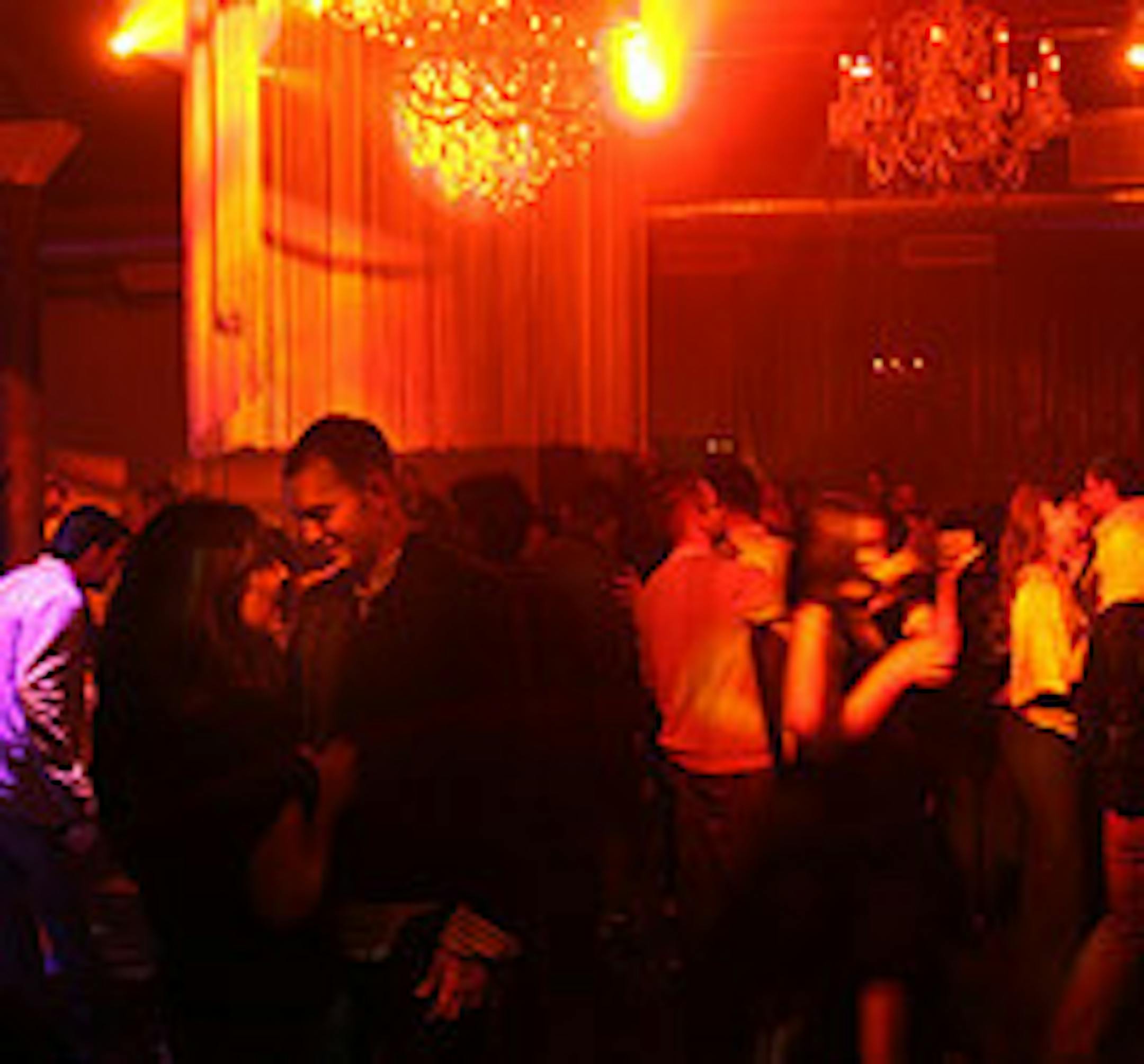 File photo of couples and singles on the dance floor at Visage in downtown Minneapolis