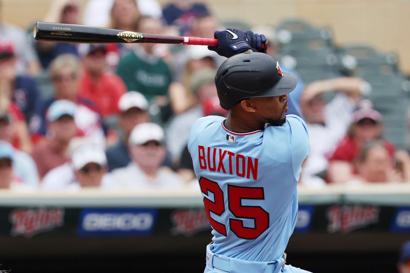 Minnesota Twins' Byron Buxton follows through on a swing Sunday.