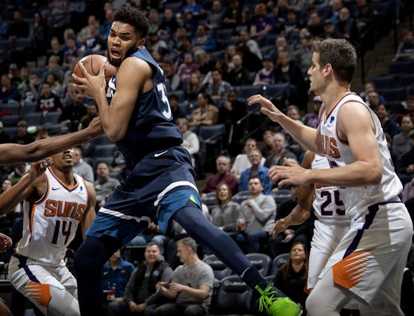 Karl Anthony-Towns grabbed a rebound in the first quarter.