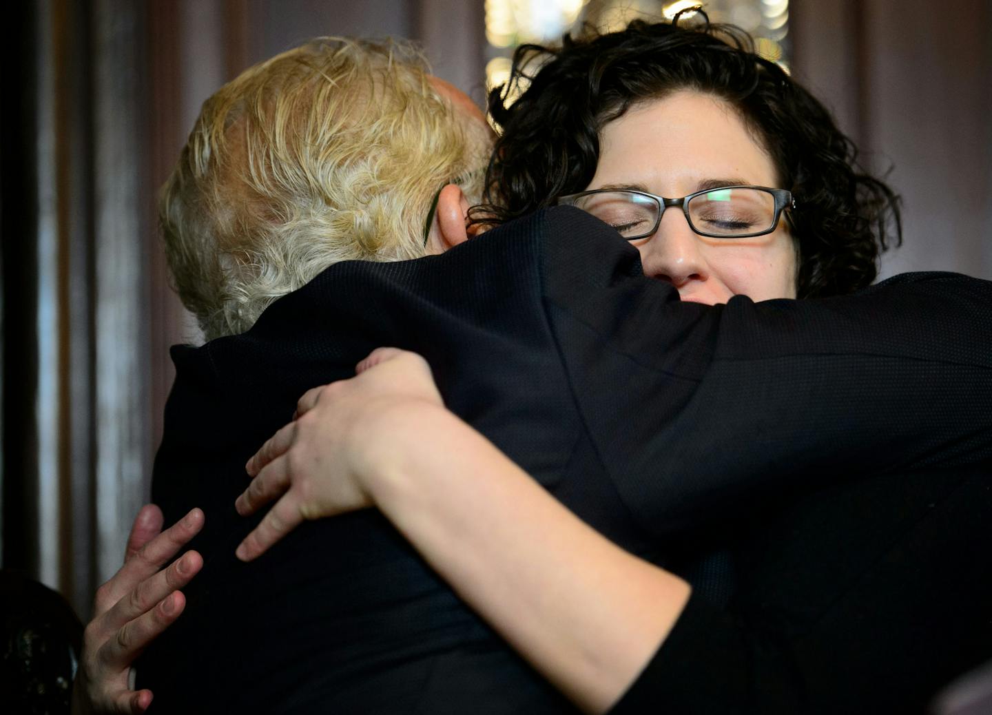 Jeff Anderson hugged client Marie Mielke after the news conference. Mielke, formerly Jane Doe 20, spoke out about sexual abuse by Re. Michael Keating with her attorney Jeff Anderson. ] GLEN STUBBE * gstubbe@startribune.com Monday, January 12, 2015 A woman speaks publicly about sexual abuse by the Rev. Michael Keating and her experience in reporting the abuse to the Archdiocese.