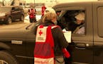 A Red Cross worker took details from newly arrived evacuees at the parking lot of the Oregon State Fairgrounds in Salem, Ore., on Sept. 8. Oregon has 