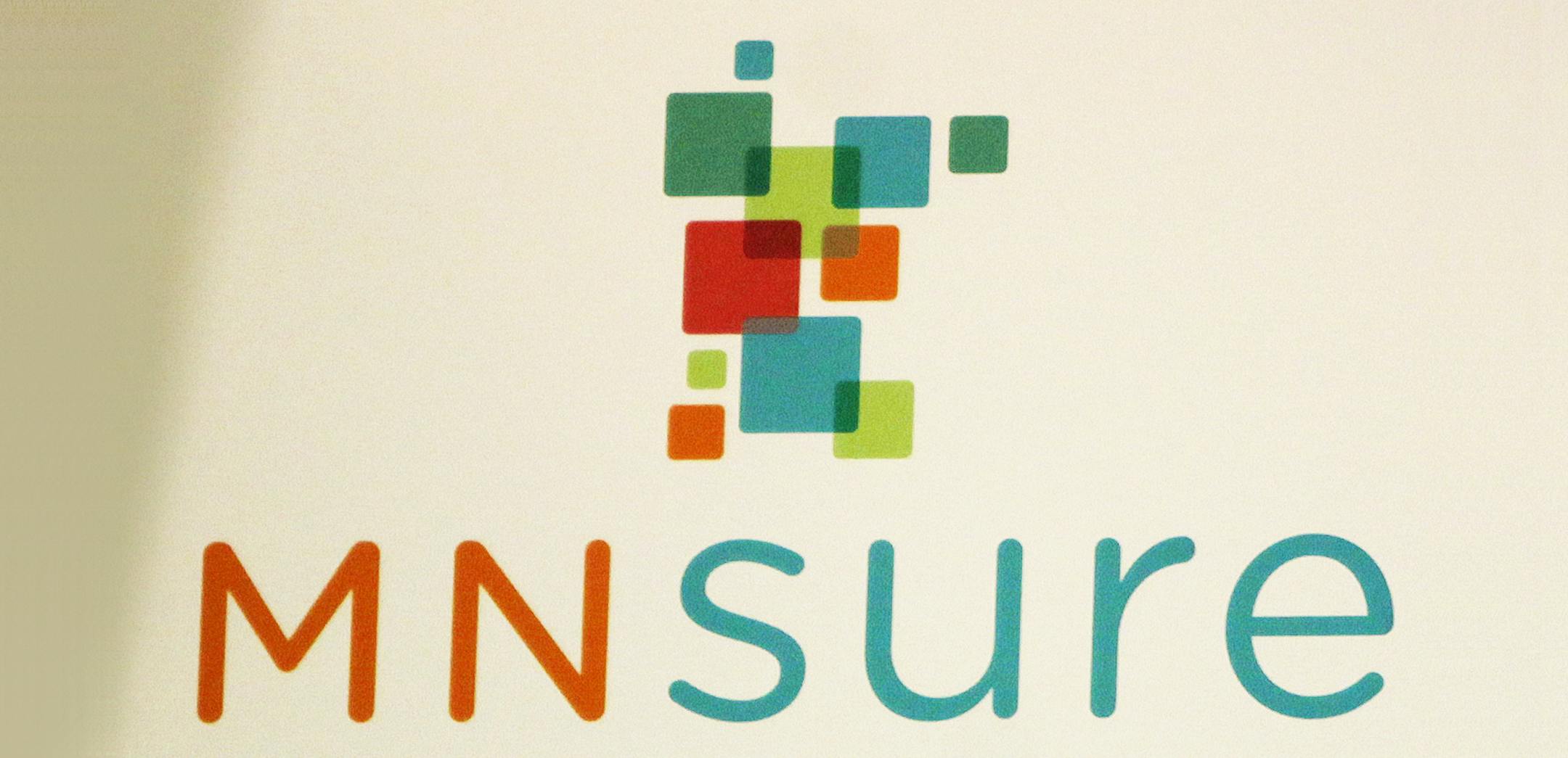 Gov. Mark Dayton, flanked by 40 state lawmakers, signed the Minnesota Health Insurance Exhange Bill into law at the Capitol in St. Paul, MN., MN on March 20, 2013. ] JOELKOYAMAïjoel koyama@startribune.com Happening at this time: Gov. Mark Dayton, flanked by 40 state lawmakers, will sign the Minnesota Health Insurance Exhange Bill into law. The bill represents one of the most sweeping changes in health coverage in this state since the passage of the Medicare and Medicaid laws. In the end, th