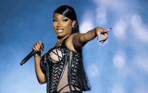 Megan Thee Stallion performed at the Reading Music Festival in 2022. A lawyer for the singer said she will fight a lawsuit filed by a photographer who