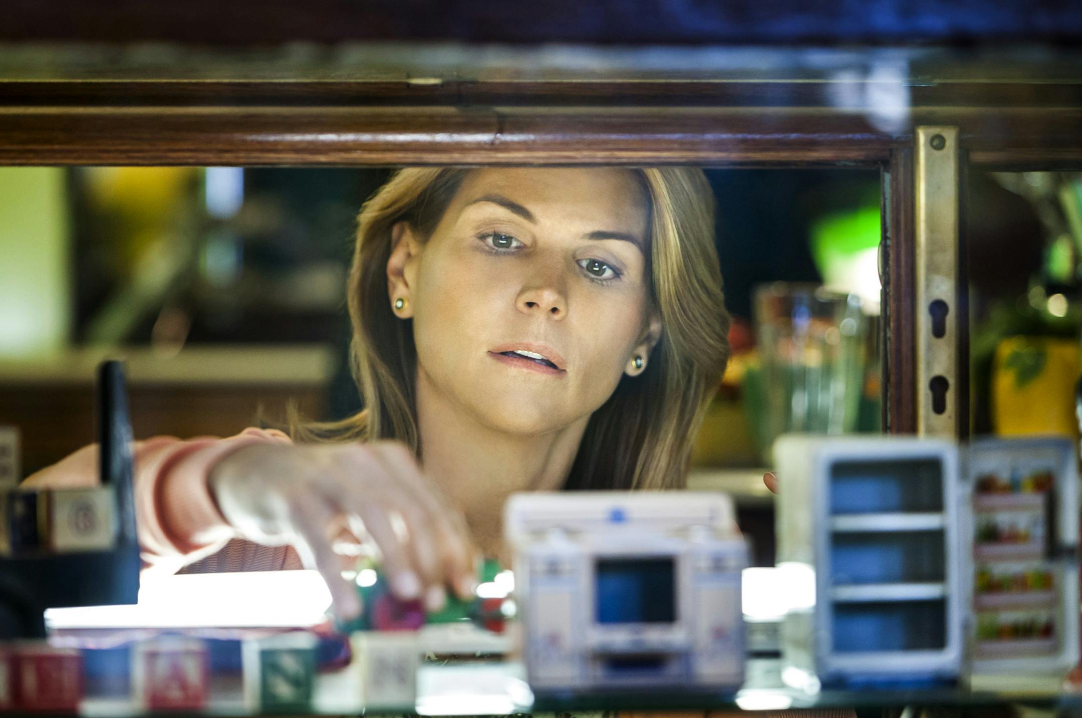 "Garage Sale Mystery" Jennifer Shannon (Lori Loughlin) is a professional garage sale maven who investigates a string of burglaries that may be related to the garage sales she frequents. Photo: Copyright 2013 Crown Media Holding