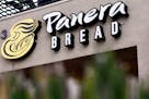 Panera Bread Co. signage is displayed outside of a restaurant in Torrance, California.