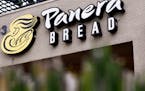 Panera Bread Co. signage is displayed outside of a restaurant in Torrance, California.