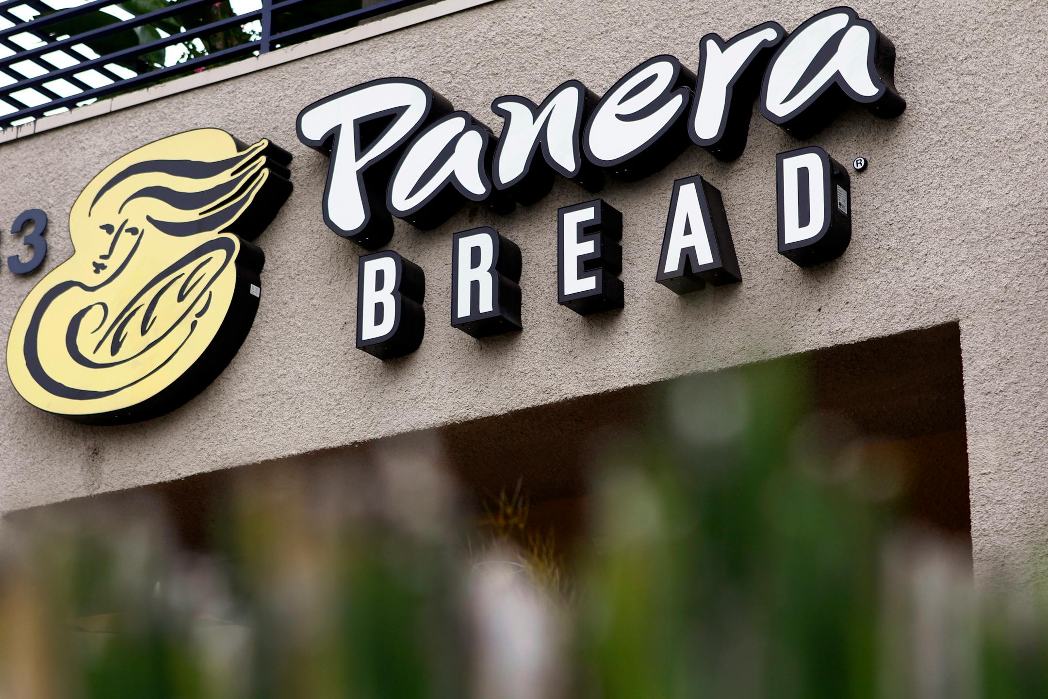 Panera Bread Co. signage is displayed outside of a restaurant in Torrance, California.