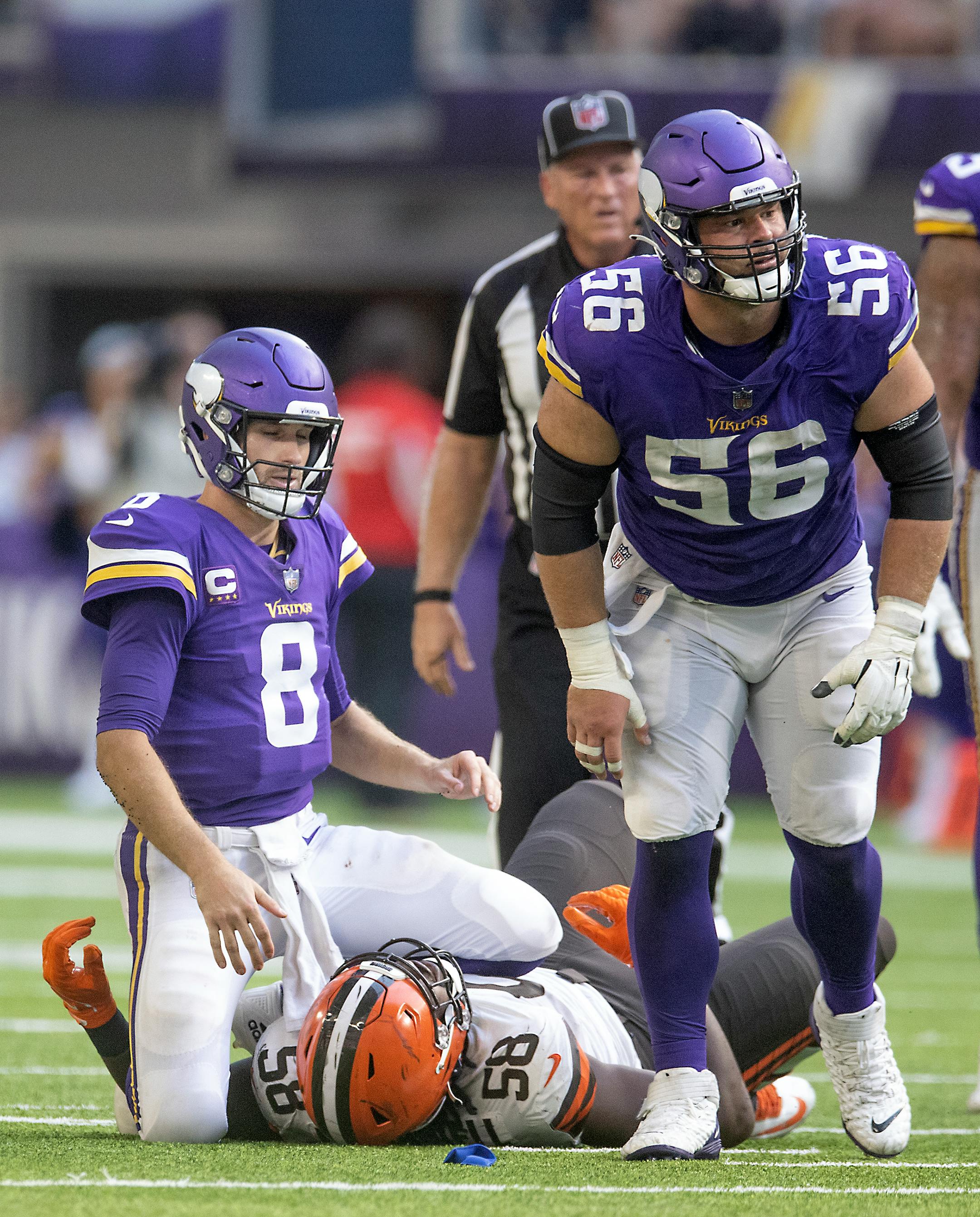 Vikings quarterback Kirk Cousins (8), left, and Vikings center Garrett Bradbury (56) watched a failed pass late in the fourth quarter of the game, Sunday, October 3, 2021 in Minneapolis, MN..