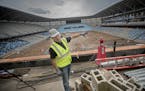 Greg Huber, Allianz Field project manager, gave a tour of the new soccer stadium Tuesday in St. Paul. Sod is due to be laid in October.