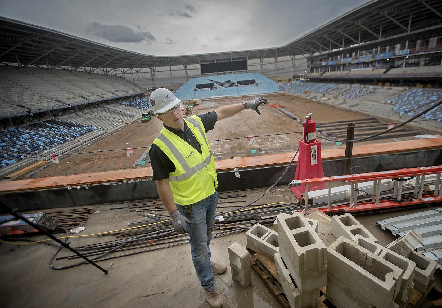 Greg Huber, Allianz Field project manager, gave a tour of the new soccer stadium Tuesday in St. Paul. Sod is due to be laid in October.