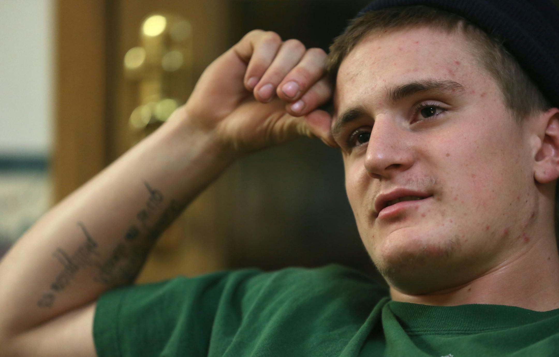 Jimmie Mayer paused as he talked about his drug addiction at his home in Cedar, Minn., on Nov. 6, 2013. Mayer had overdosed on heroin and was found in his bedroom. Now he is on the road to recovery.