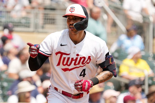 Carlos Correa pointed to the Twins dugout after hitting a first-inning home run against Boston on Thursday. Byron Buxton followed with another two bat