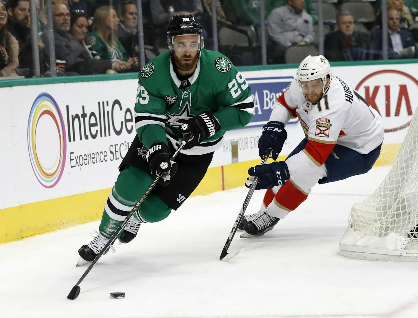 Dallas Stars defenseman Greg Pateryn (29) handles the puck in front of Florida Panthers left wing Jonathan Huberdeau (11) during an NHL hockey game, Tuesday, Jan. 23, 2018, in Dallas. (AP Photo/Tony Gutierrez) ORG XMIT: OTKTG160