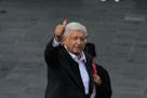 Andres Manuel Lopez Obrador gives a thumbs-up after casting his vote on July 1, 2018 in Mexico City, Mexico.