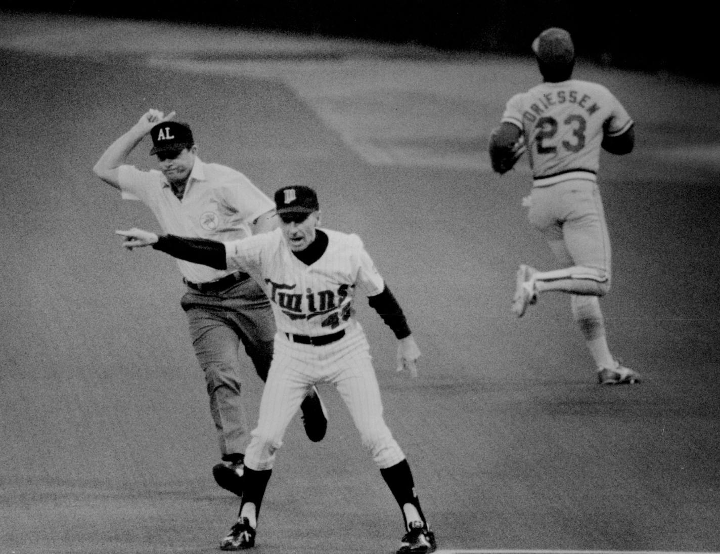 October 25, 1987 Coach Wayne Terwilliger waved on Dan Gladden as Dan Driessen futilely pursued Gladden's triple. Jeff Wheeler, Minneapolis Star Tribune