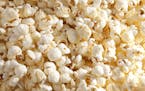 Closeup of popcorn. Some microwave popcorns contain trans fat. iStock
