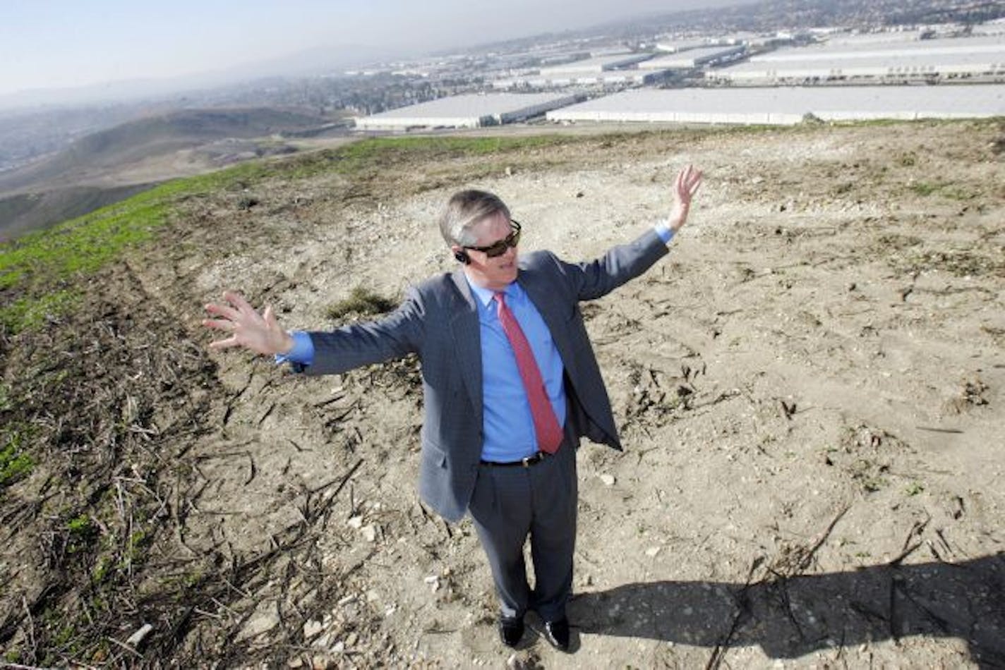 John Semcken, a partner in Majestic Realty with Ed Roski, stands on the site of Roski's proposed new $800 million National Football League stadium, in City of Industry, Calif.