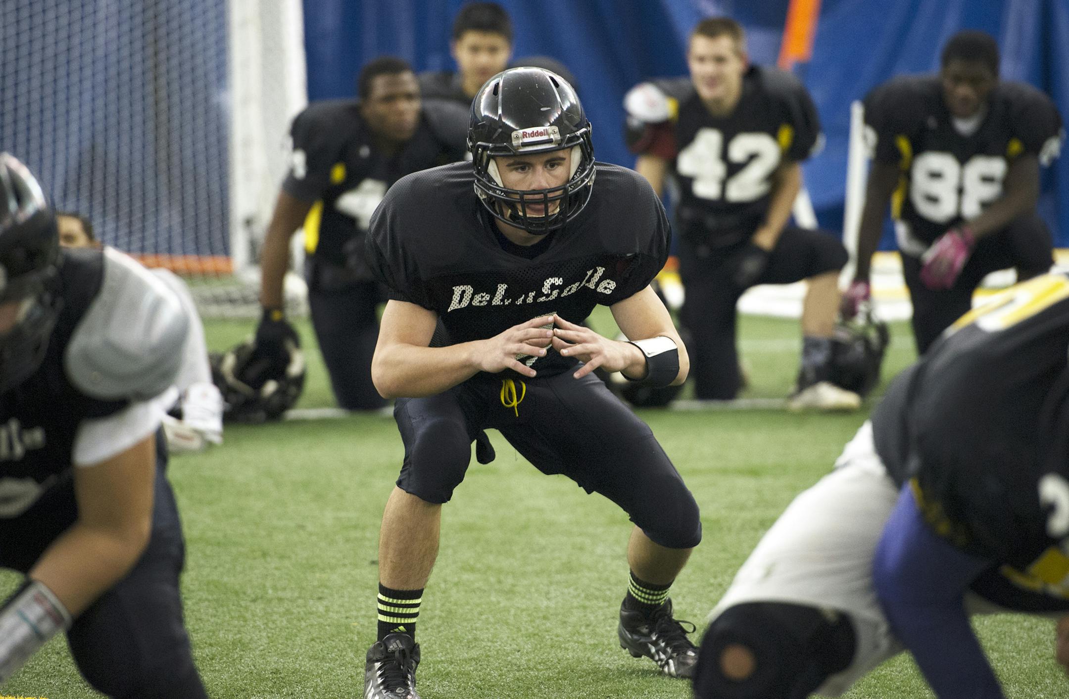 DeLaSalle Junior Billy Hart practices Wednesday night at the Vadnais Sports Center. Hart stepped in this year as Quarterback after the departure of Reid Travis from the team. ] (Matthew Hintz, Vadnais Heights, 111313) ORG XMIT: MIN1311131742570726