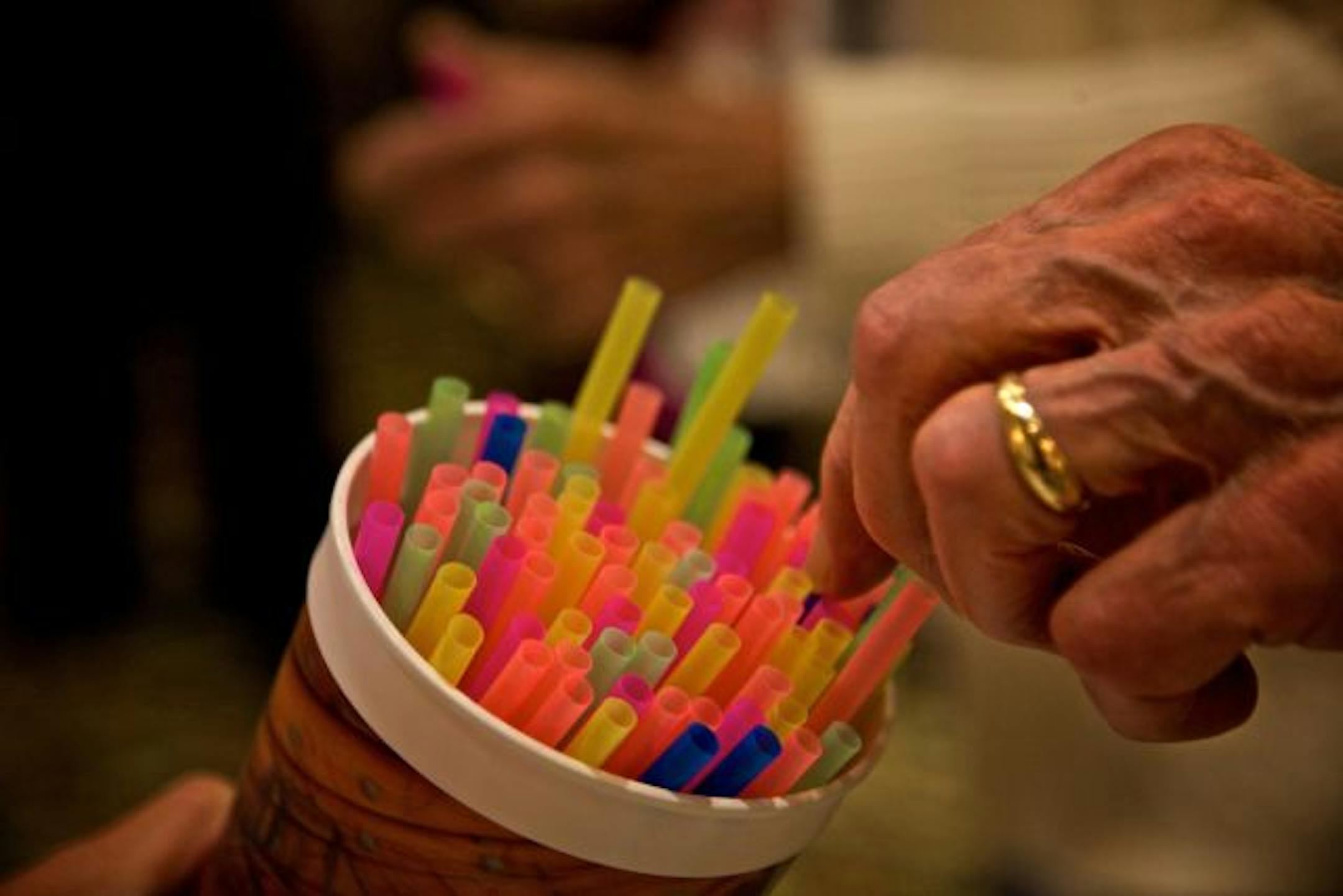 Straws were handed to each person attending the choral therapy session to help them use their breath correctly while singing.