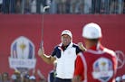 Phil Mickelson put on his birdie face after sinking an 18-foot putt on the 18th hole in his match against Sergio Garcia.