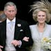FILE - In this Saturday, April 9, 2005 file photo, Britain's Prince Charles and his bride Camilla Duchess of Cornwall leave St George's Chaple in Wind