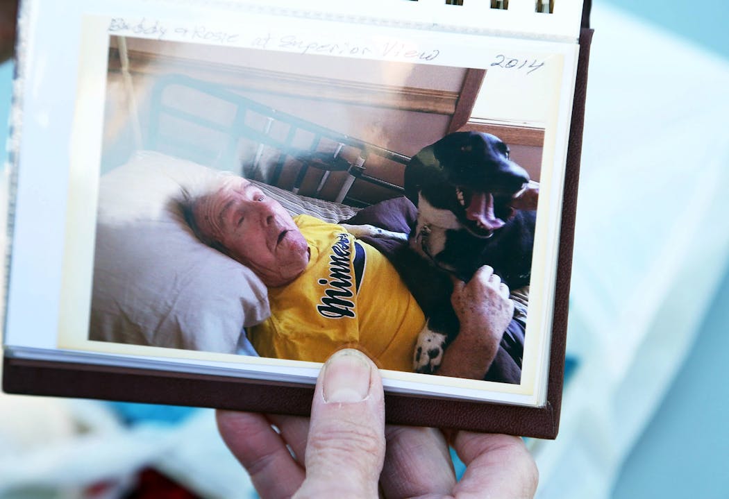 Among Janice Hiller's prized possessions is a photo of her late husband, Wally, with a family dog. 