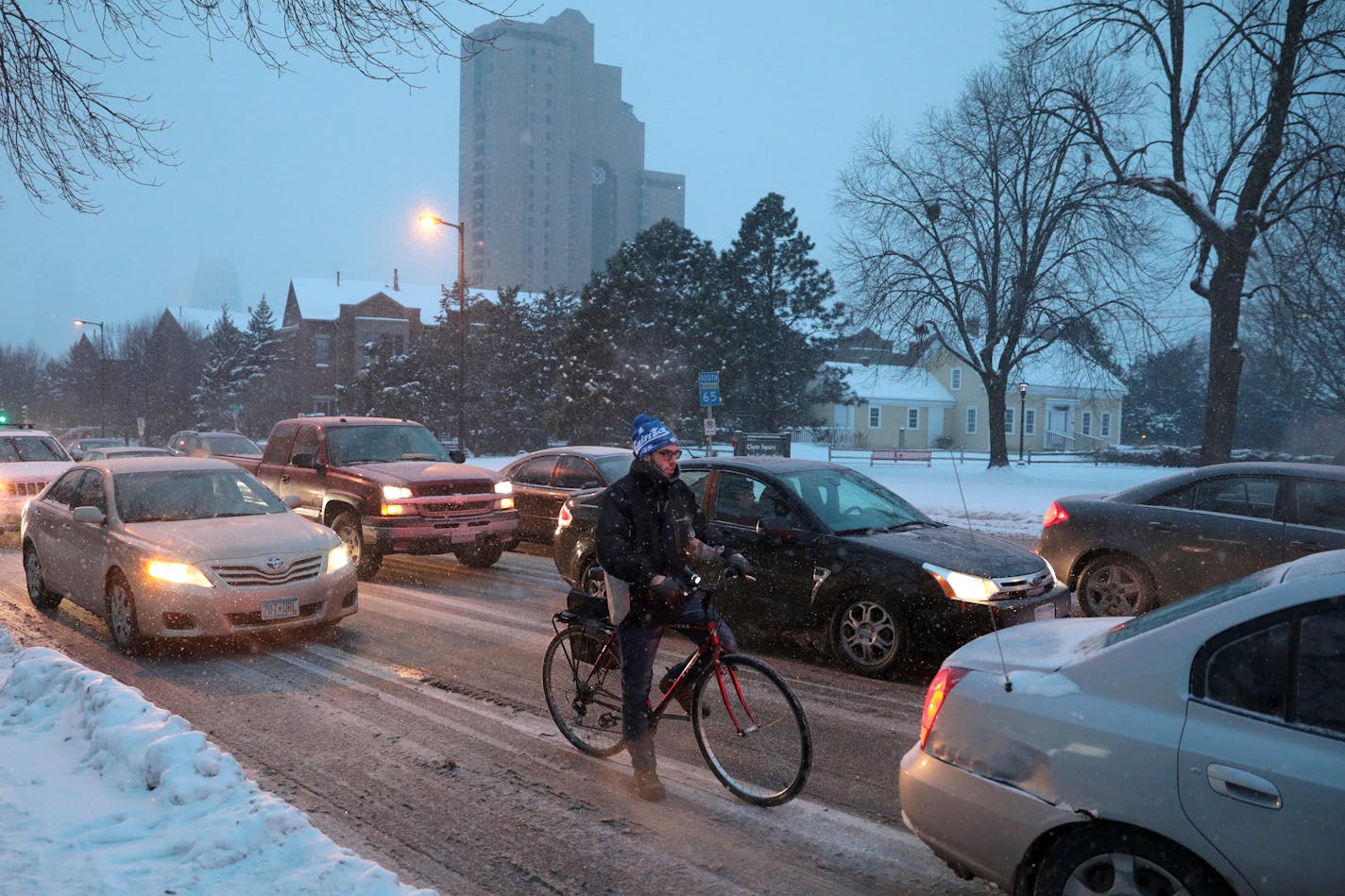 Fresh snow and icy roads slowed commuters Friday evening during a storm that will also bring extreme cold to Minnesota this weekend.