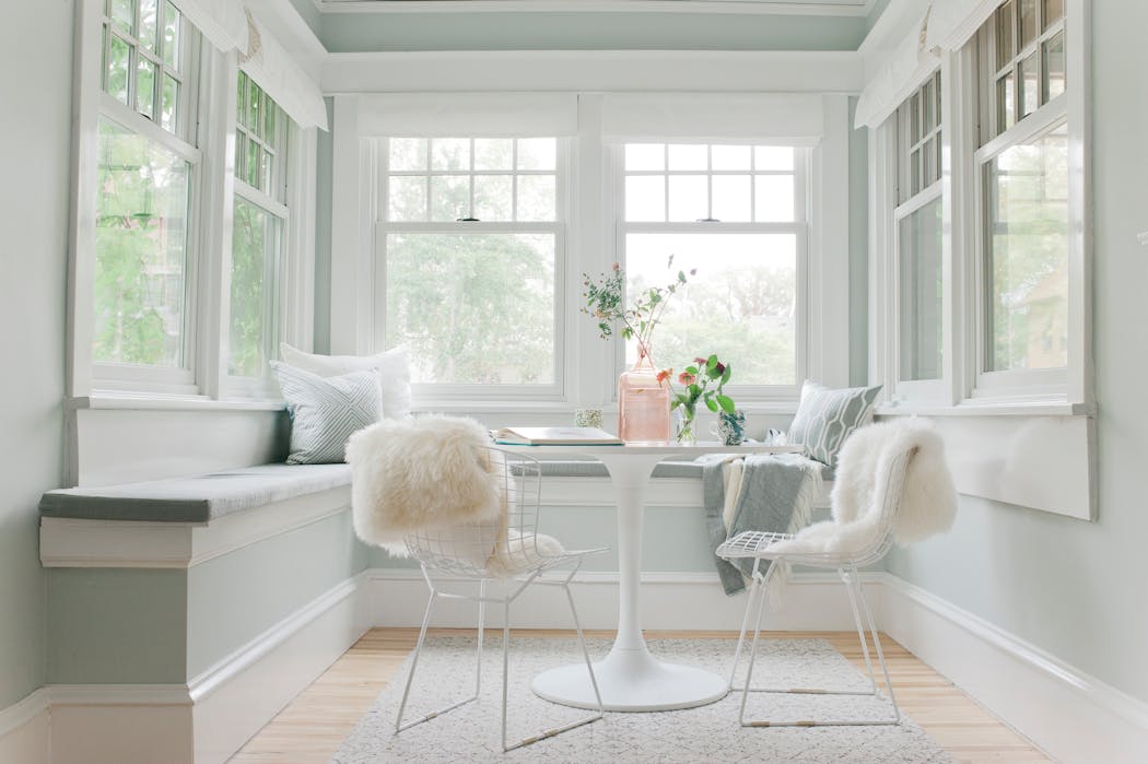Sunroom designed by Emily Henderson in a St. Paul home.
