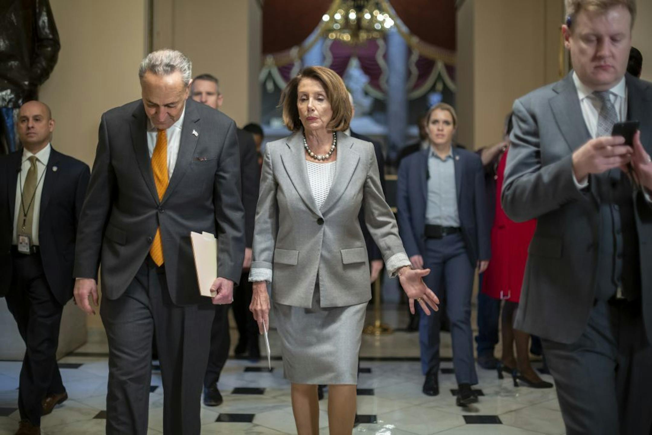 Senate Minority Leader Chuck Schumer and House Speaker Nancy Pelosi met Wednesday with furloughed federal workers to discuss the effects of the partial government shutdown.